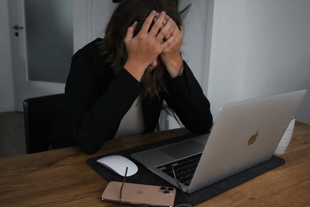 frustrated lawyer looking at a computer screen - Attorney lead generation services