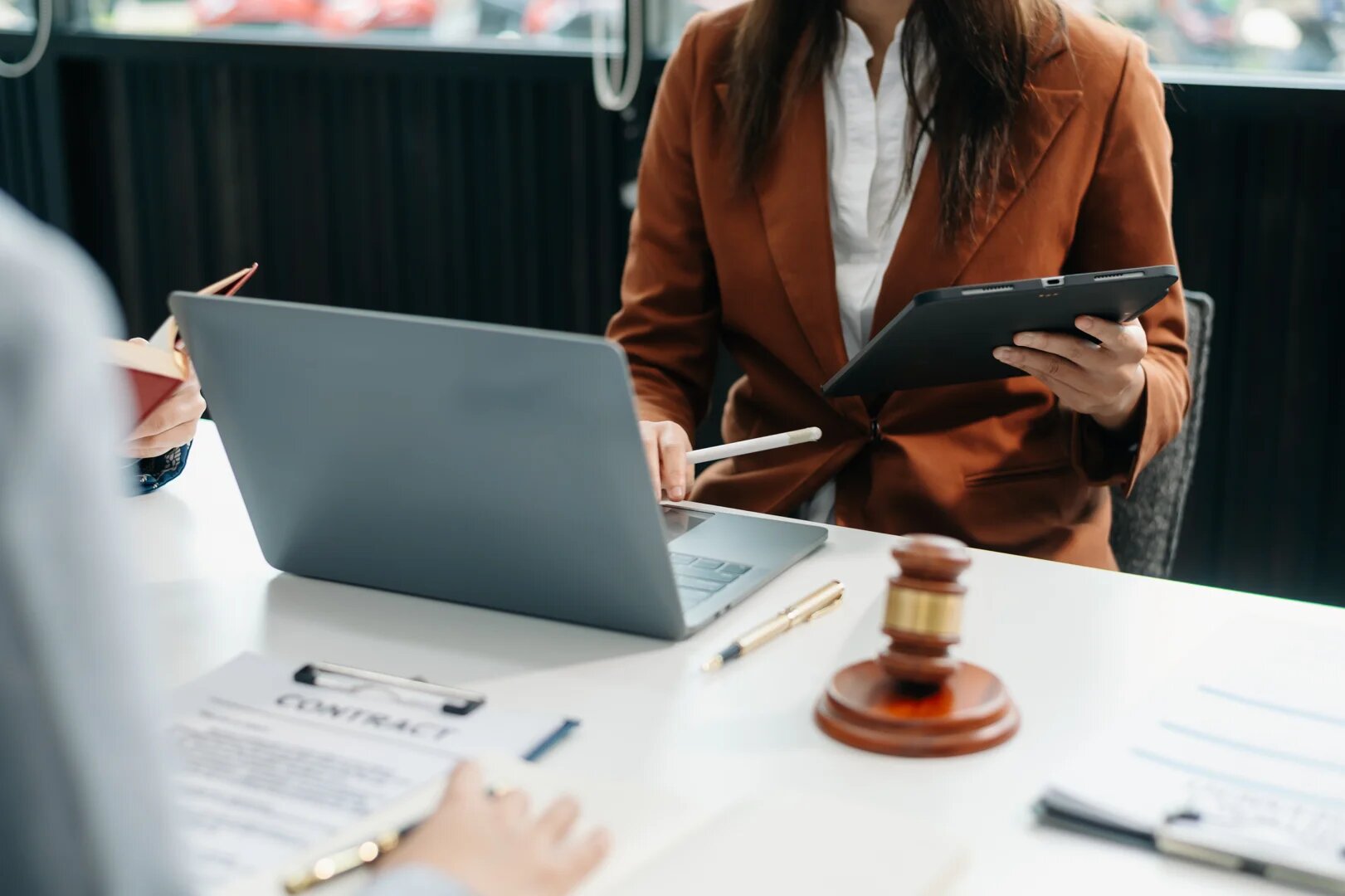 estate planning attorney meeting with a family in a modern law office