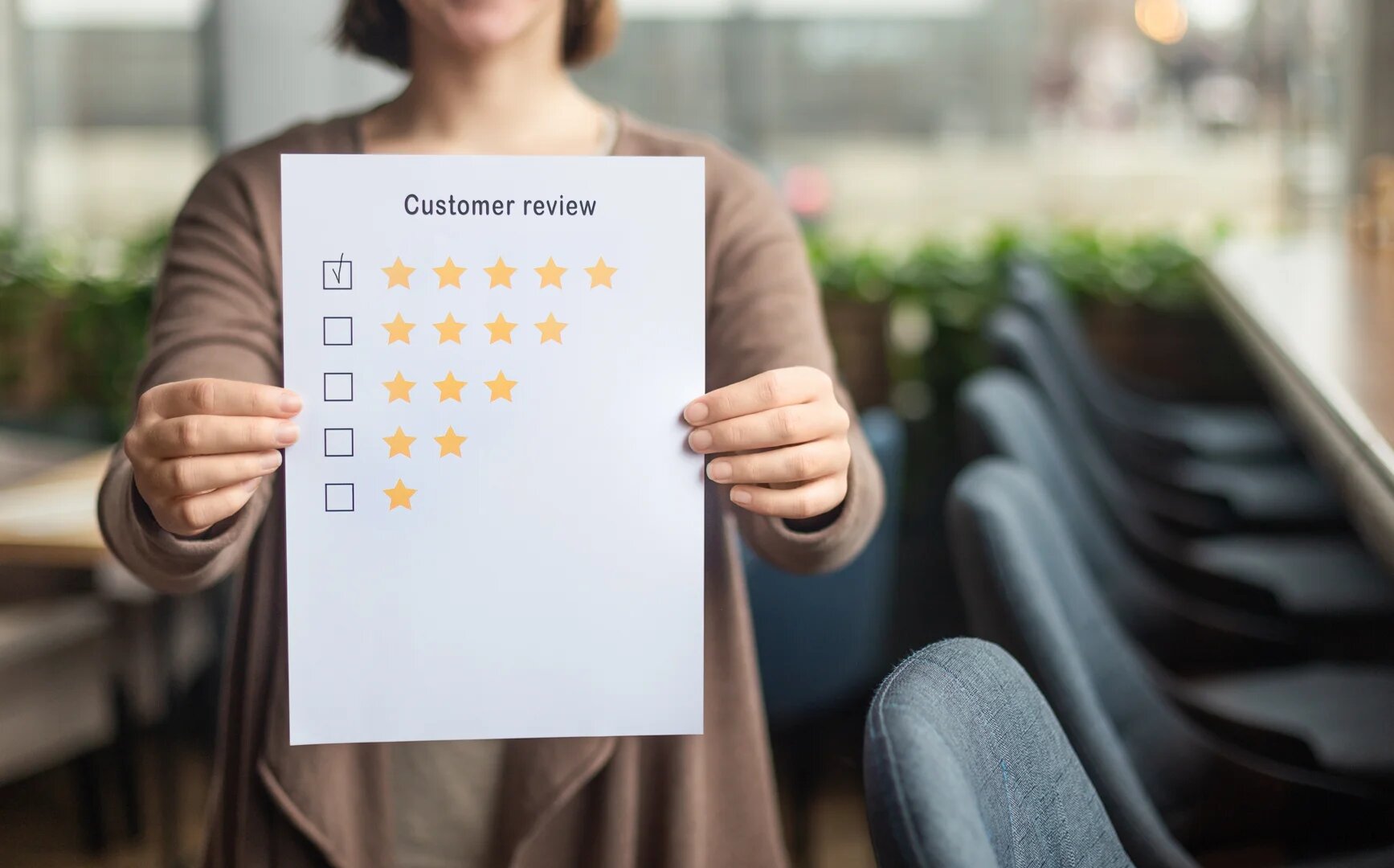 attorney reviewing online reviews on laptop